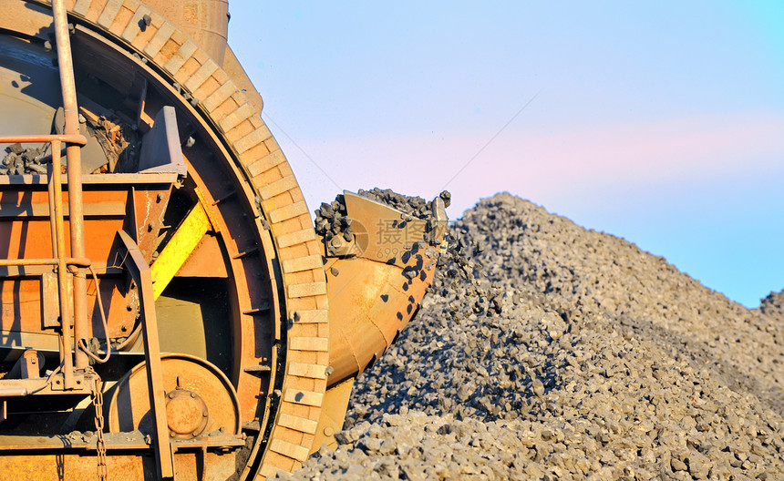 挖棕煤挖掘水桶车轮挖土机力量公用事业地面工作车辆生态装载机活力开发燃料图片