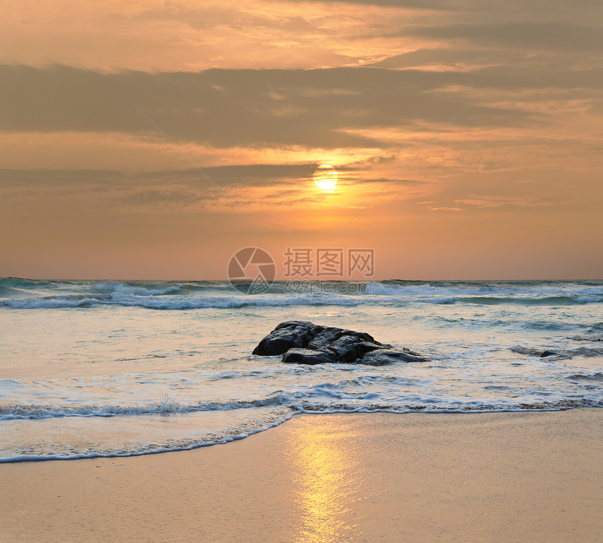 日落时的海滨石头海岸线风景天空太阳支撑卷云橙子自由图片