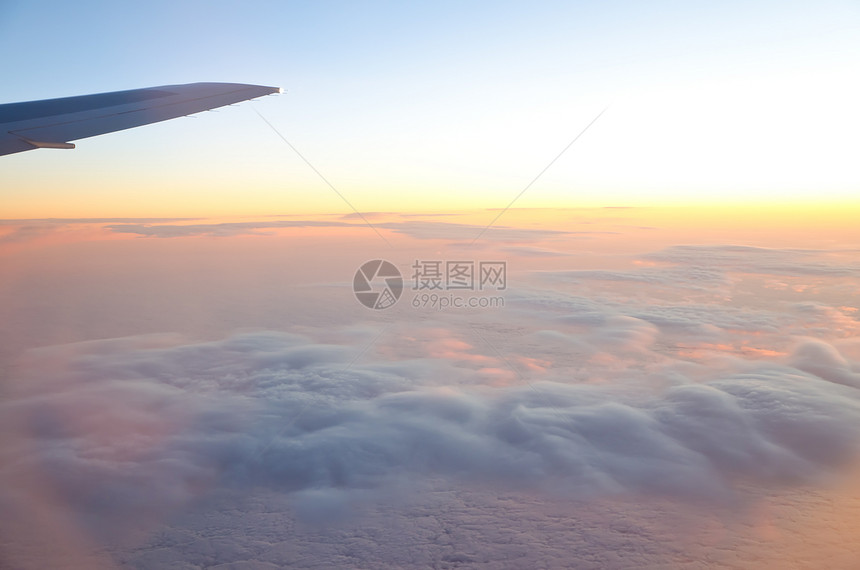 飞机翼空气蓝色天际地平线航空公司水平日落假期商业旅行图片