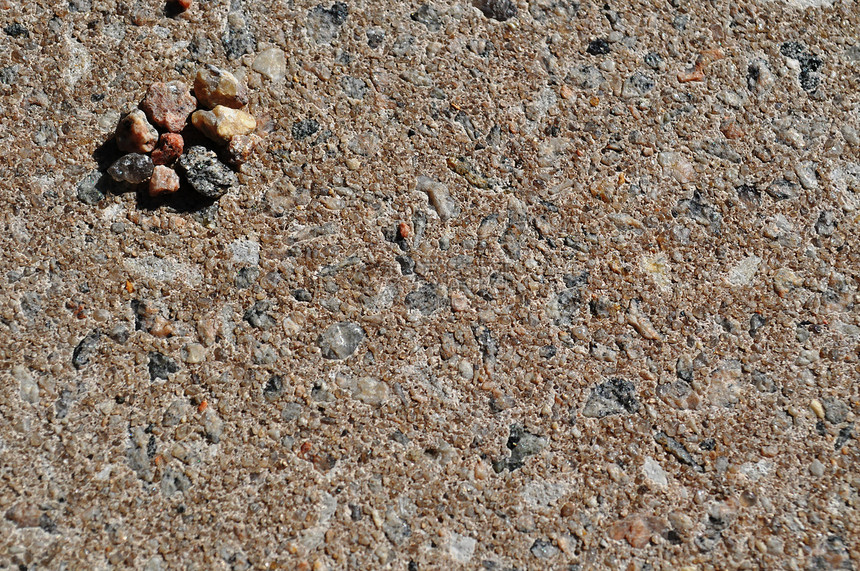岩石石头本底灰色棕褐色卵石鹅卵石图片