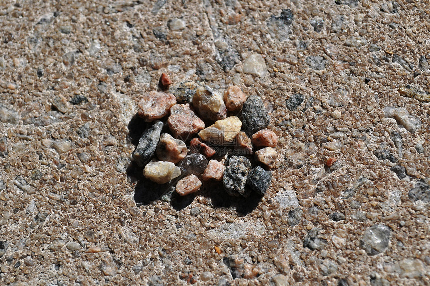岩石石头本底卵石鹅卵石棕褐色灰色图片