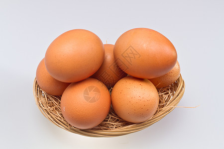拉坦篮子二中的鸡蛋背景