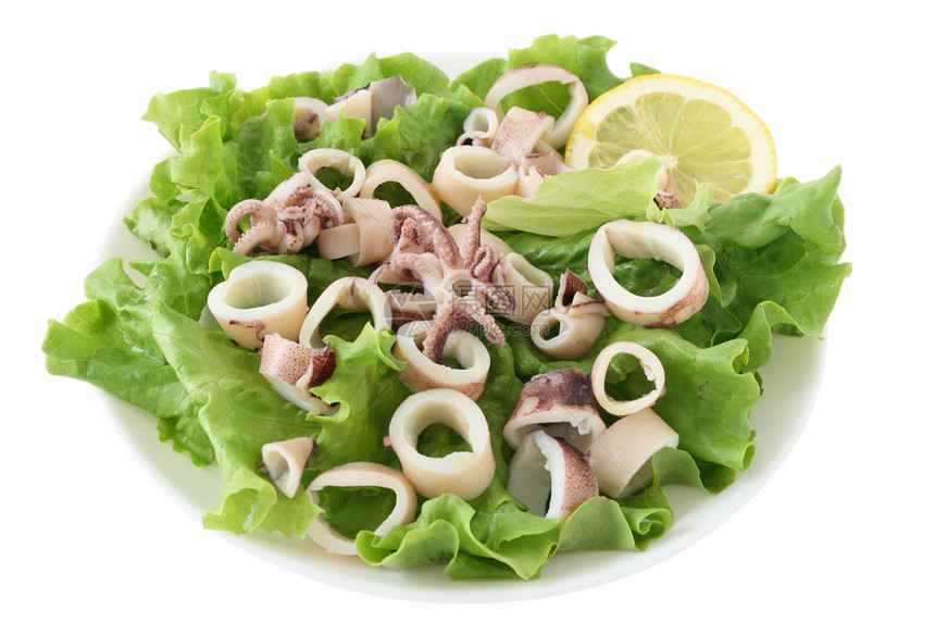 带有章鱼沙拉食物白色盘子柠檬午餐海鲜图片