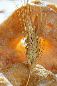 糖耳朵美味面包面包店糖和小麦加热木头谷物营养蛋糕饮食烘烤食物耳朵植物甜点背景