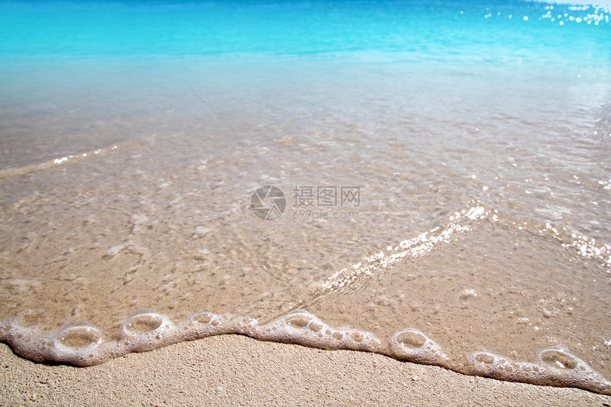 加勒比清洁海滩沙沙质海岸波海景热带异国晴天情调风景海岸线娱乐青色旅游图片
