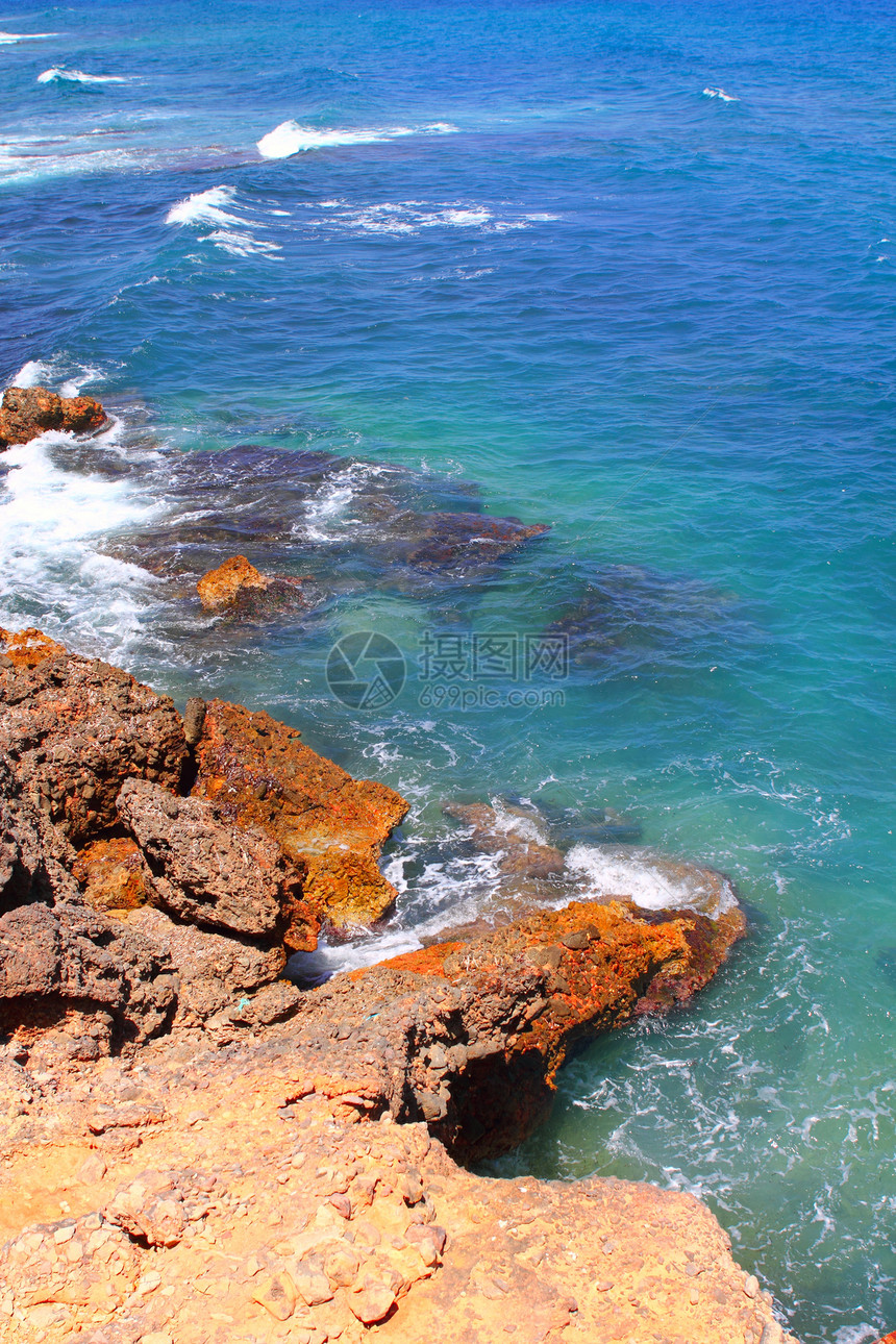 拉罗塔斯南地中海海滨 Denia天气地平线波纹海滩石头海岸蓝色海浪运动环境图片