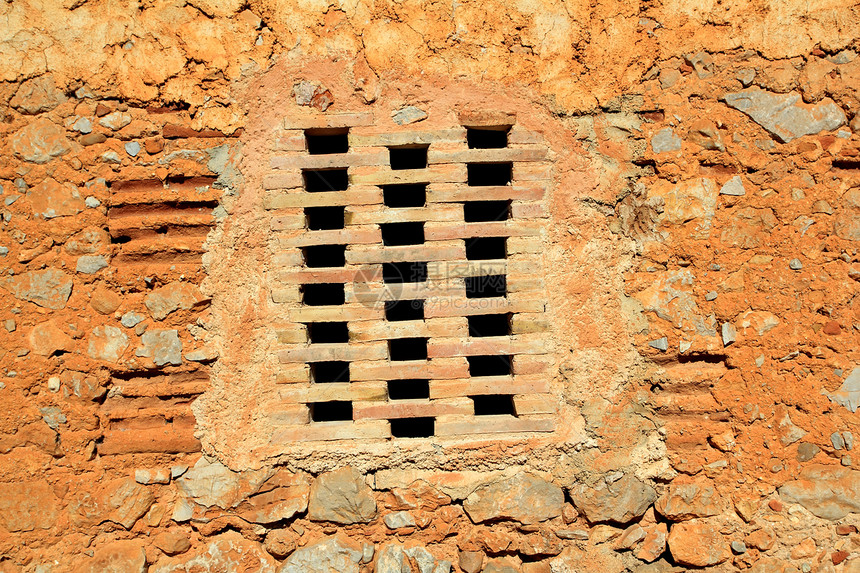 砖瓦墙中的砖块窗 古建筑古董岩石石头废墟砂浆墙纸裂缝石工建筑学水泥图片