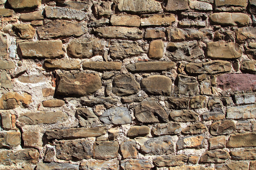 古老的泥瓦纹理墙背面水泥石工岩石裂缝城堡材料砂浆城市建筑学橙子图片