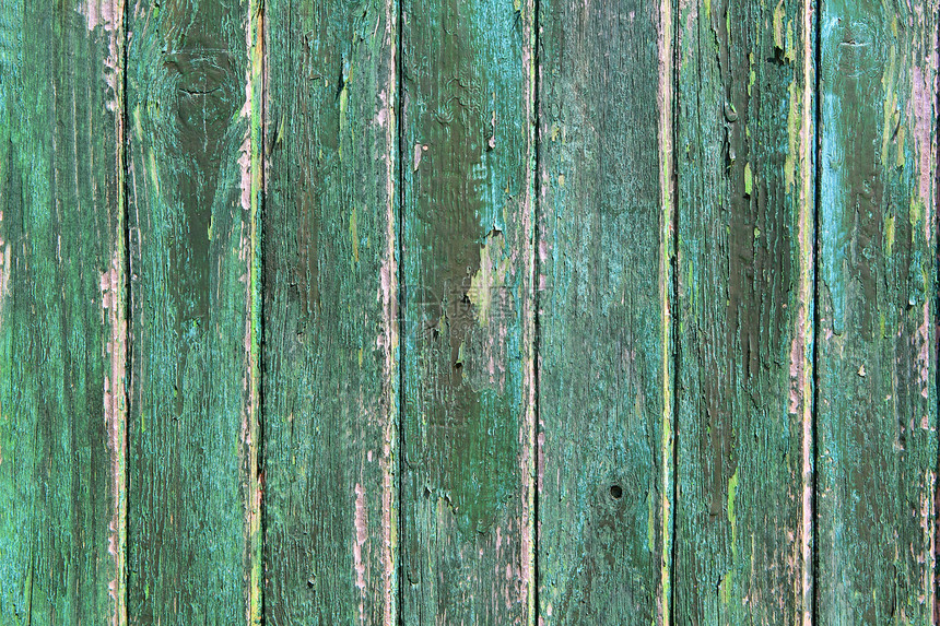 年老风化的绿色木制油漆门质图片