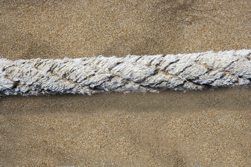 沙滩沙滩上古老的海洋绳索图片