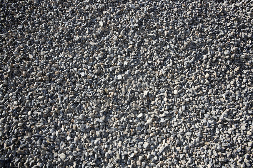 灰色 缩结底底灰色花岗岩地质学岩石库存碎石滚动矿业制造业商业灰尘图片