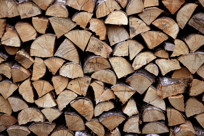 以砍木柴堆木木为模式松树树干贮存壁炉国家圆圈戒指活力库存柴堆图片