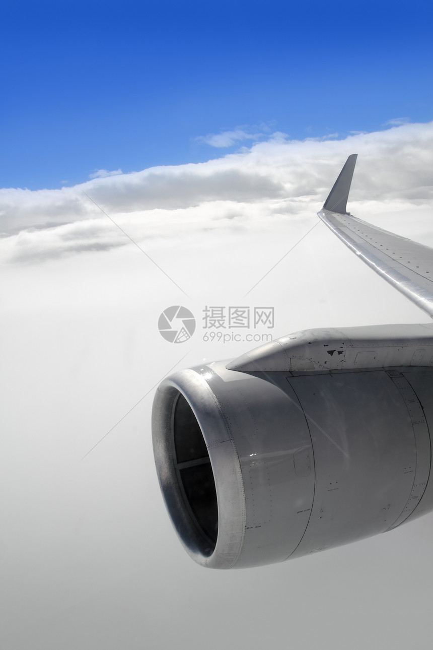 机翼飞机涡轮机飞行阳光水分涡轮航班天空地平线天堂青色蓝色运输图片