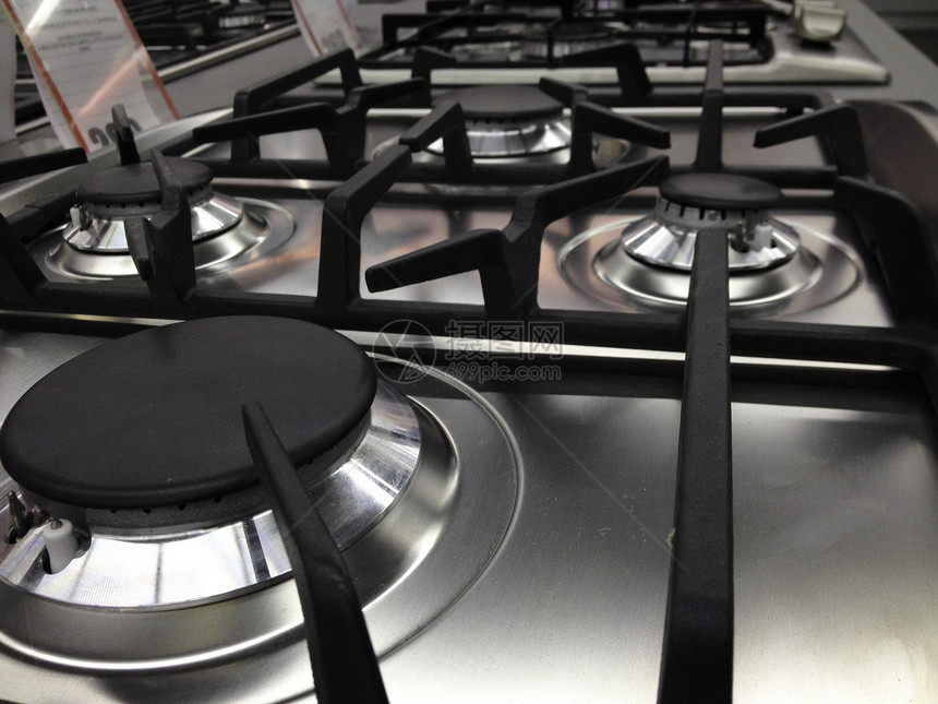 厨房中的现代炉灶细节火焰控制气体食物活力工具安全烹饪燃料力量图片