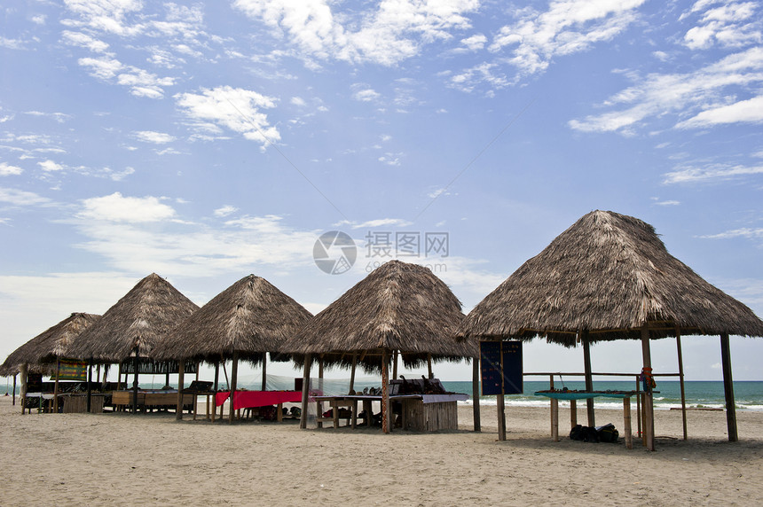 Monpiche海滩上的小屋热带冲浪情调棕榈太阳旅行假期海洋海岸异国图片
