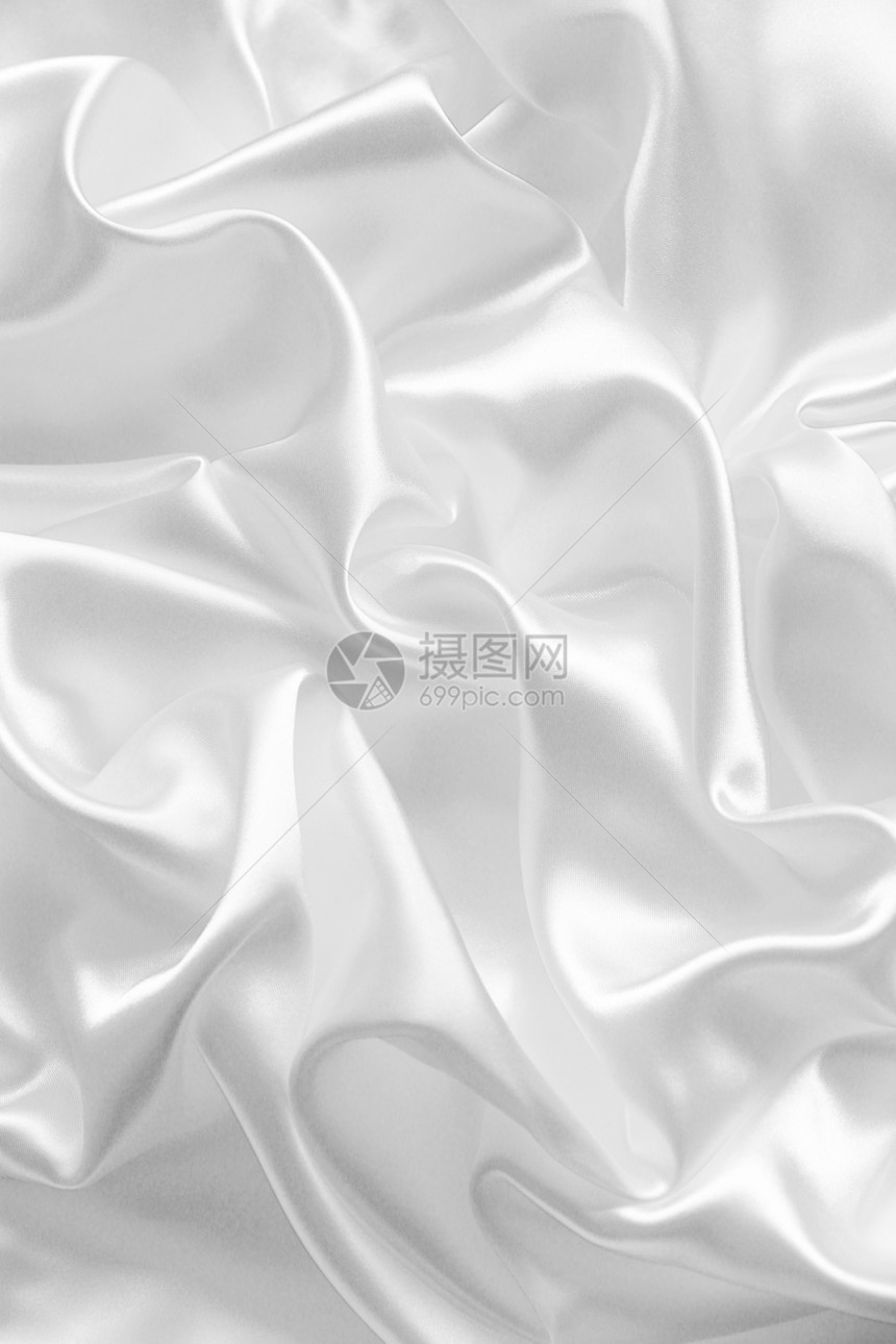 作为婚礼背景的平滑优雅白色丝绸新娘布料折痕银色投标涟漪织物海浪曲线材料图片