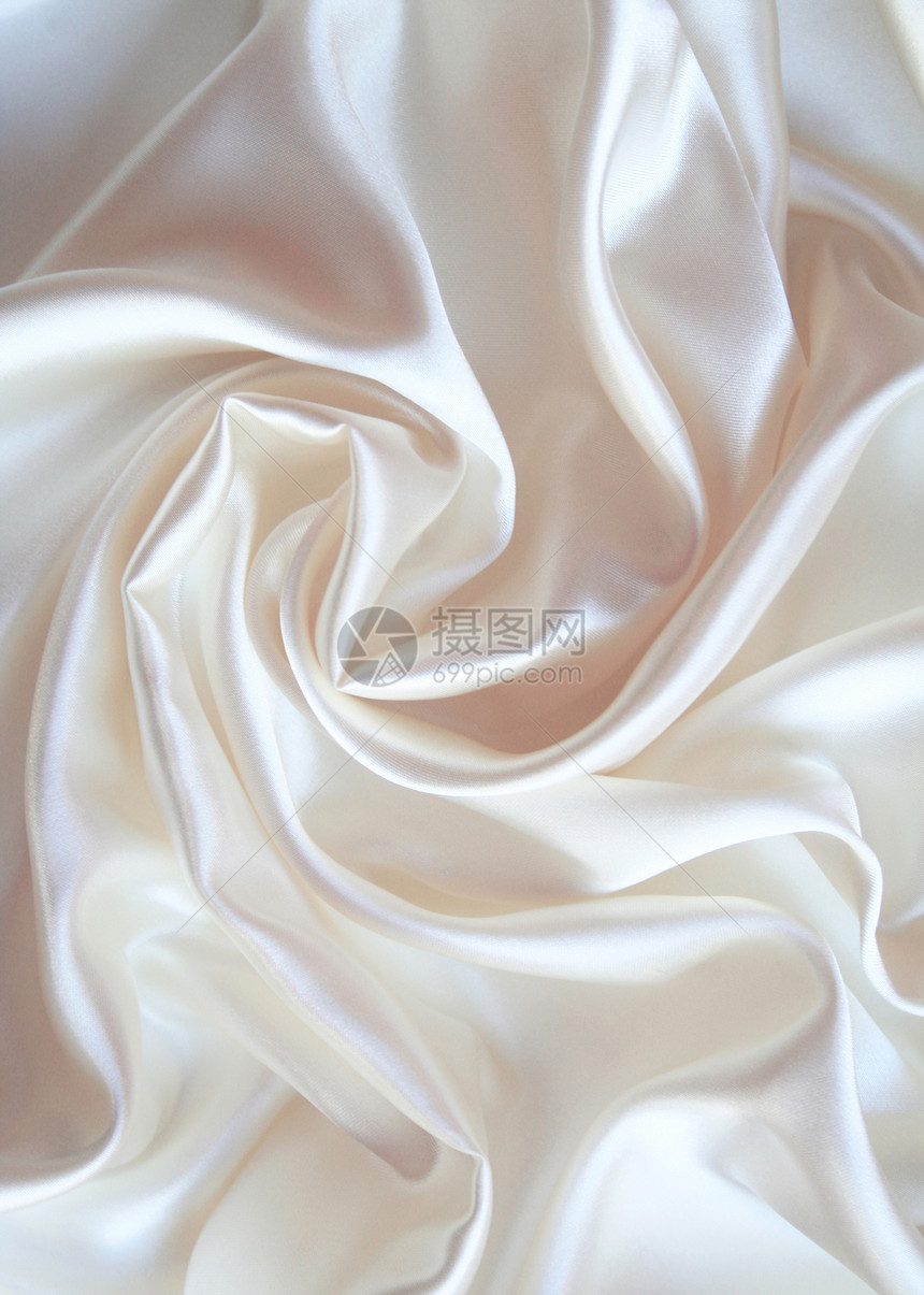 平滑优雅的白色丝绸作为背景投标材料婚礼纺织品反光新娘布料银色曲线织物图片