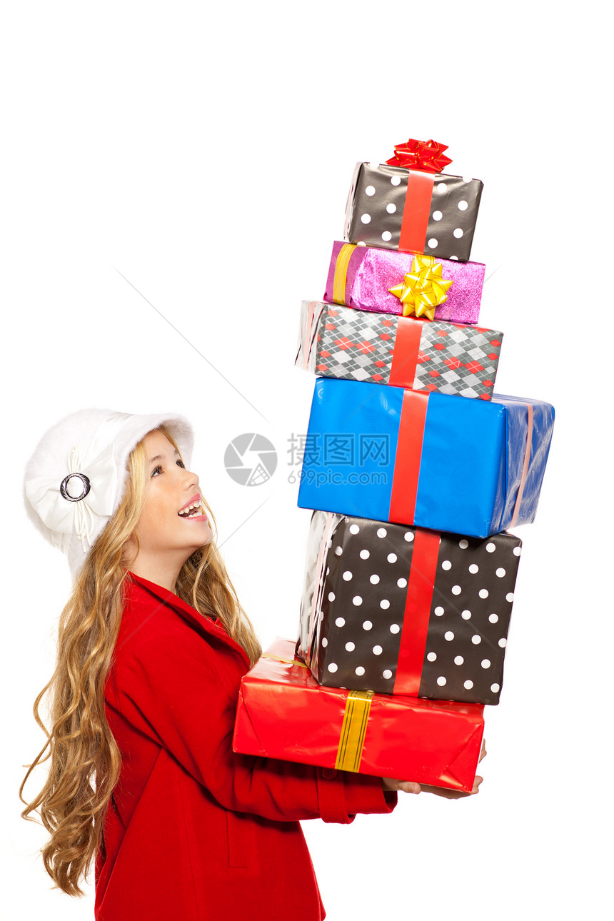 拿着许多礼物的女孩 在她手上堆叠季节快乐生日情感丝带外套孩子惊喜金发女郎金发图片
