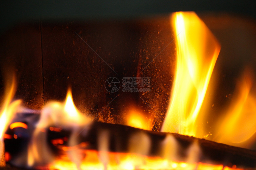 火炉中的木木木木火焰日志运动摄影壁炉木火化石时间燃料木头图片