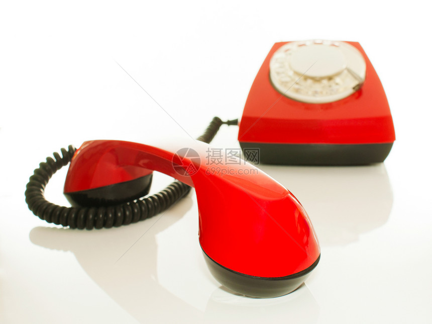 红式老旧电话  联系我们的概念塑料电讯技术数字拨号古董风格复古听筒旋转图片
