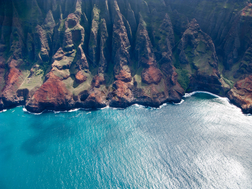 Kauai纳帕利海岸地质学手指海洋山脉悬崖岩石旅游直升机波浪植被图片