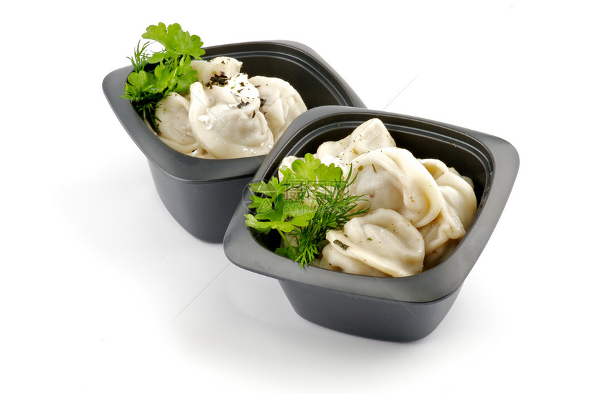 含酸奶油和绿菜的肉蛋白质厨房午餐食物营养美食文化香菜水饺热饭饺子图片