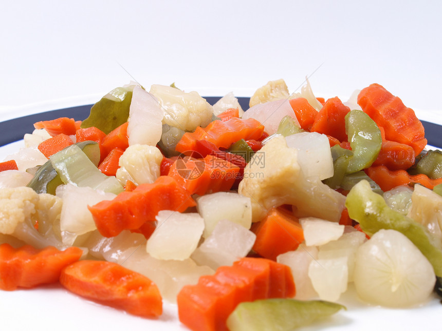 混合蔬菜绿色盘子洋葱胡椒菜花萝卜美食食物宏观橙子图片
