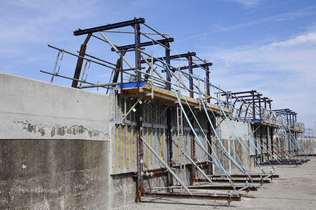 修理混凝土码头的建筑工场背景图片