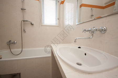 洗手间洗澡水龙头收银台浴室建筑学盆地背景图片