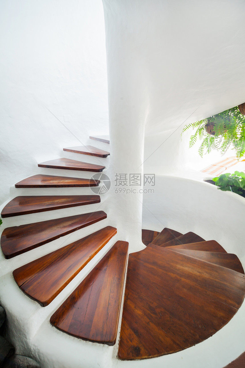 白色螺旋楼梯绿色栏杆椭圆形商业艺术木头圆形椭圆迷宫建筑图片