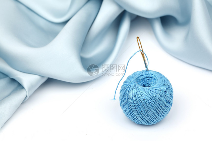 线材料细绳工作裁缝手工业衣服布料海浪针线活白色图片