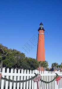 普恩斯德莱昂内莱昂棕榈红色历史性灯塔地标海滩天空高清图片