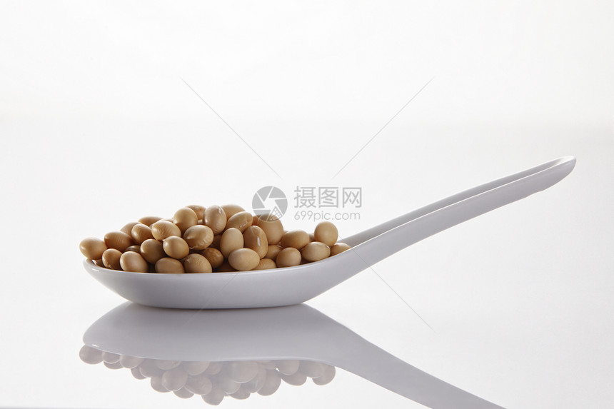 有豆子的勺子豆浆种子大豆基因豆腐黄色宏观蔬菜遗传学家纤维图片