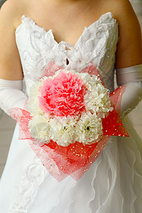 结婚布花花朵新娘白色裙子花束粉色背景图片