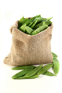 甜豆蔬菜食物烹饪黄麻袋豆类水果绿色背景图片