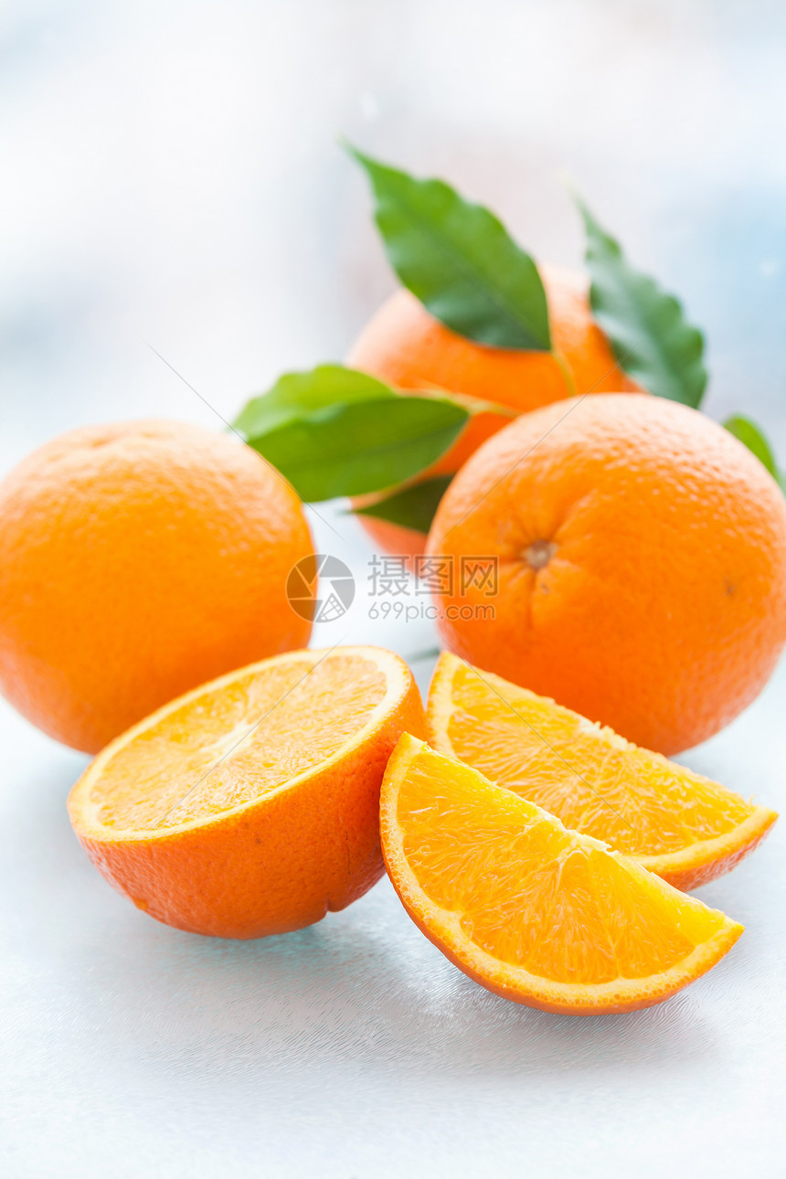 橙色白色绿色水果食物橙子宏观农业刀刃叶子圆圈图片