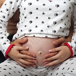 怀孕女性腹部父母丈夫压痛夫妻妻子母性男性背景图片