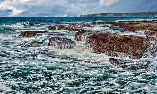 海岸上岩石的海浪波浪风景海岸线溅射弹性背景图片
