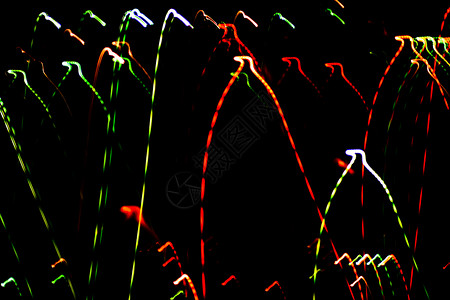 抽象的庆典星星魔法派对运动灯光娱乐黑色背景图片