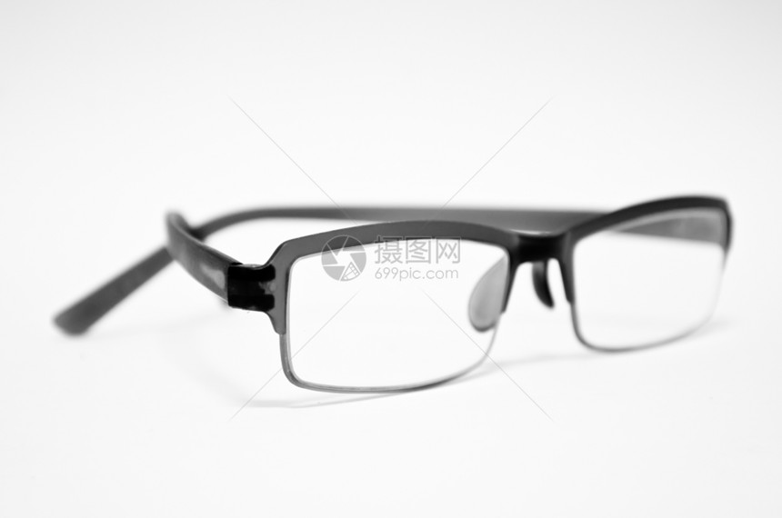 白色背景的眼镜艺术光学镜片望远镜阅读框架塑料眼睛反射图片