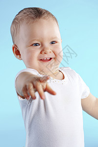 婴儿宝宝童年蓝色儿童工作室手指微笑快乐孩子背景图片