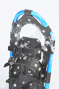 雪雪鞋白色雪鞋下雪背景图片