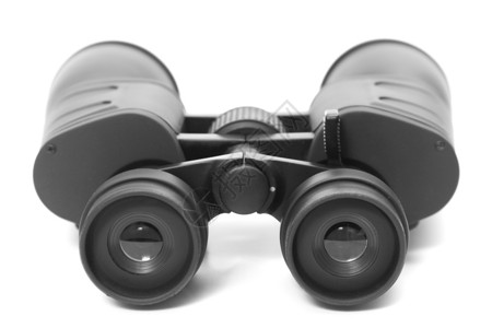 白色背景上的双望远镜橡皮水平镜片黑色光学眼镜乐器工具监视背景图片