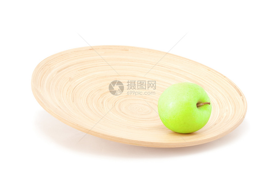 一个苹果在木板的中央小吃盘子白色孤独早餐绿色甜点黄色水果图片