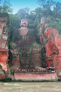 中国四川黎山大佛佛洞穴雕刻宗教旅行峨嵋纪念碑历史岩石上帝文化背景图片