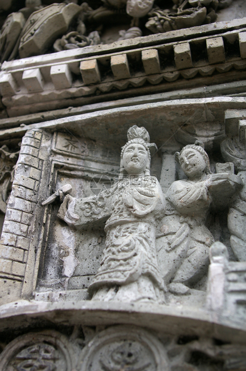 寺庙外的中国雕刻岩石建筑学微笑雕塑纪念碑旅行上帝历史旅游废墟图片