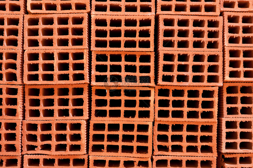 砖砖堆材料水平建筑材料石工建筑红色陶瓷建造硬件画幅图片