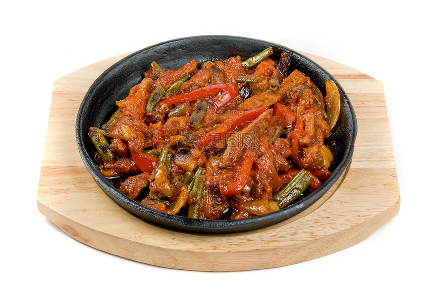 以锅制成的肉类和蔬菜餐厅用餐美食食物胡椒紫色油炸烹饪饮食午餐图片