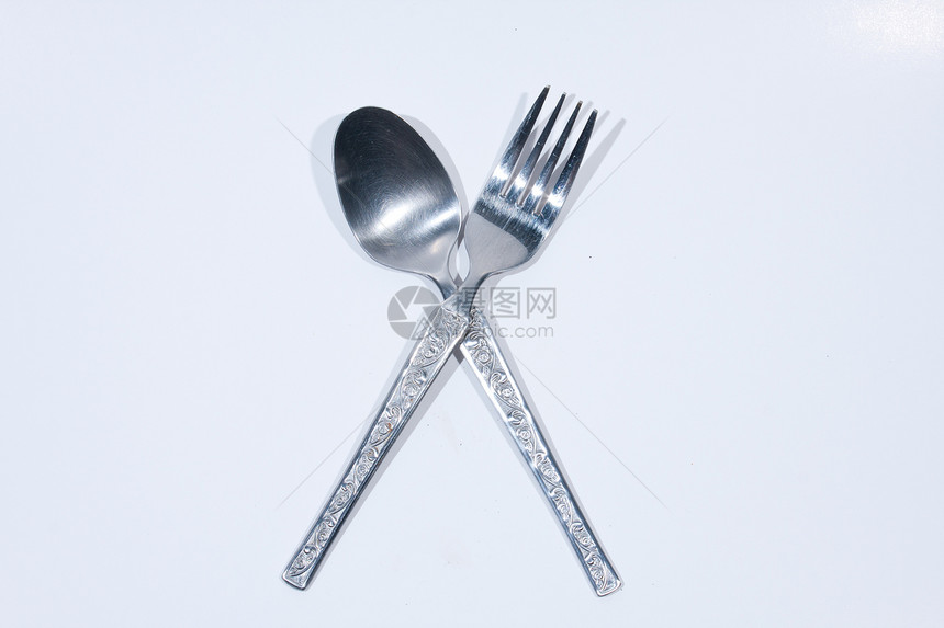 白背景上的勺子和叉子商业厨房餐厅庆典团体白色正方形食物午餐桌子图片