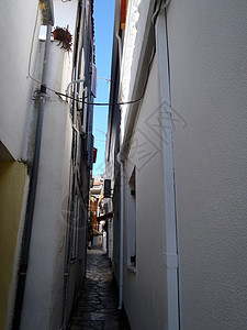 非常狭窄的街道背景图片